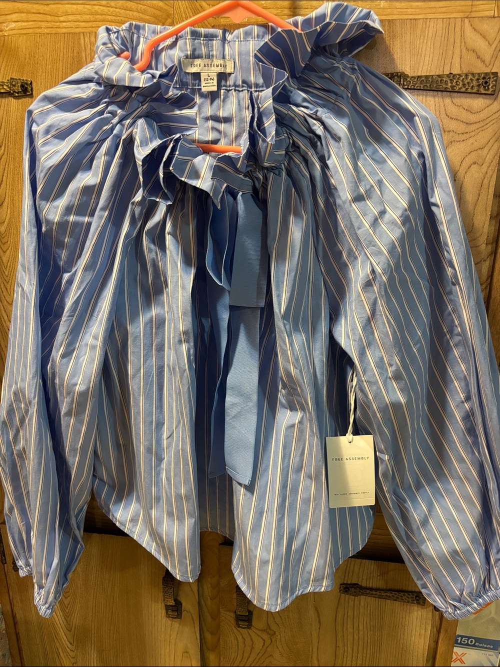 Long sleeve blouse with bow, blue striped size L 12/14